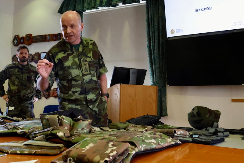 Col George O’Connell displays the equipment worn by Irish soldiers as part of their new body armour.