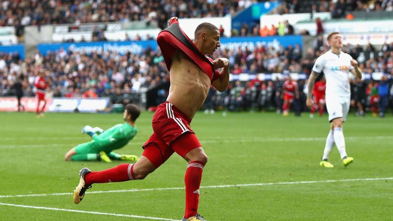 Richarlison celebrates scoring his   goal. Photograph: Michael Steele/Getty Images