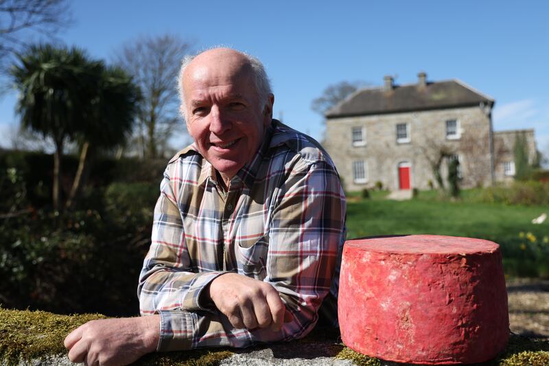 Tom Burgess at his farm, which supplies the milk for his cheese