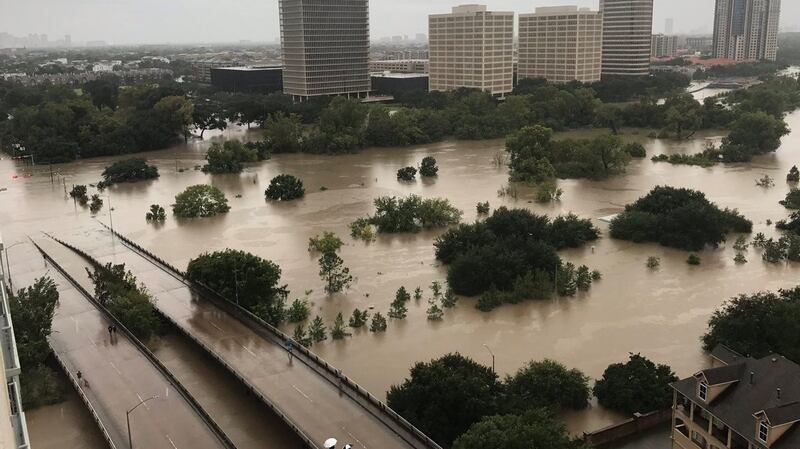 The flooded downtown area of Houston  is seen from a high-rise building along Buffalo Bayou after Hurricane Harvey inundated the Texas Gulf coast with rain, causing widespread flooding. Photograph: Twitter/@caroleenarn/Reuters
