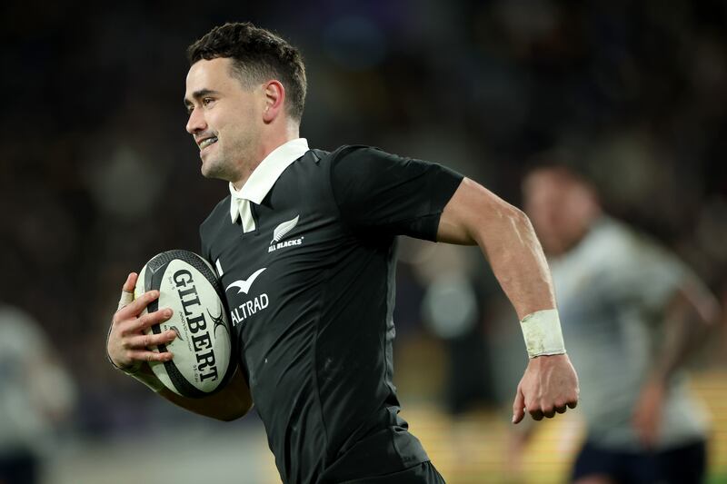 New Zealand's Will Jordan scores a try against Italy. Photograph: Phil Walter/Getty Images