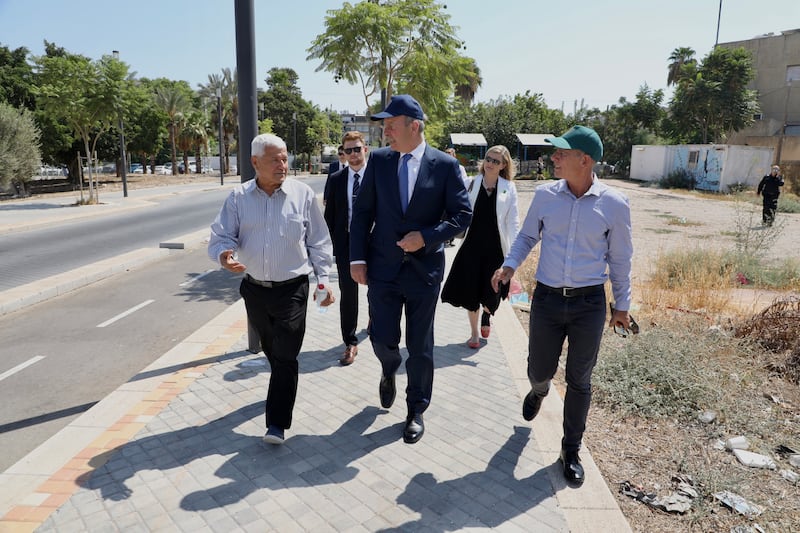 Tánaiste Micheál Martin on a walk-about in the ancient city of Lod, which has both Arab and Jewish communities. Photograph: Phil Behan/DFA