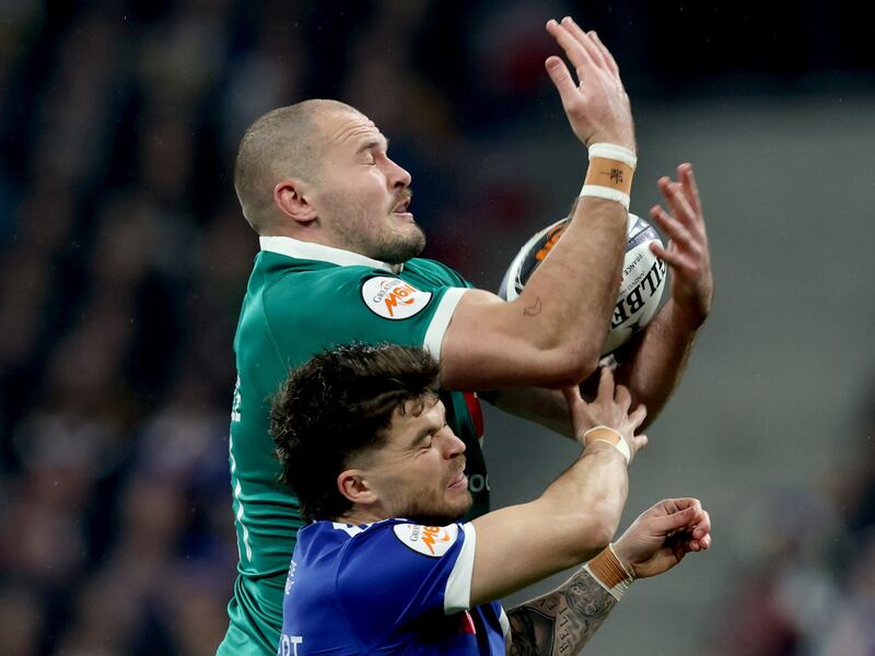 Ireland winger Jacob Stockdale competes with France's Matthieu Jalibert during the Six Nations. Photograph: Billy Stickland/Inpho