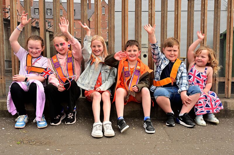 Children gather at Carlisle Circus in Belfast ahead of the main Orange Order parade. Photograph: Arthur Allison/Pacemaker Press