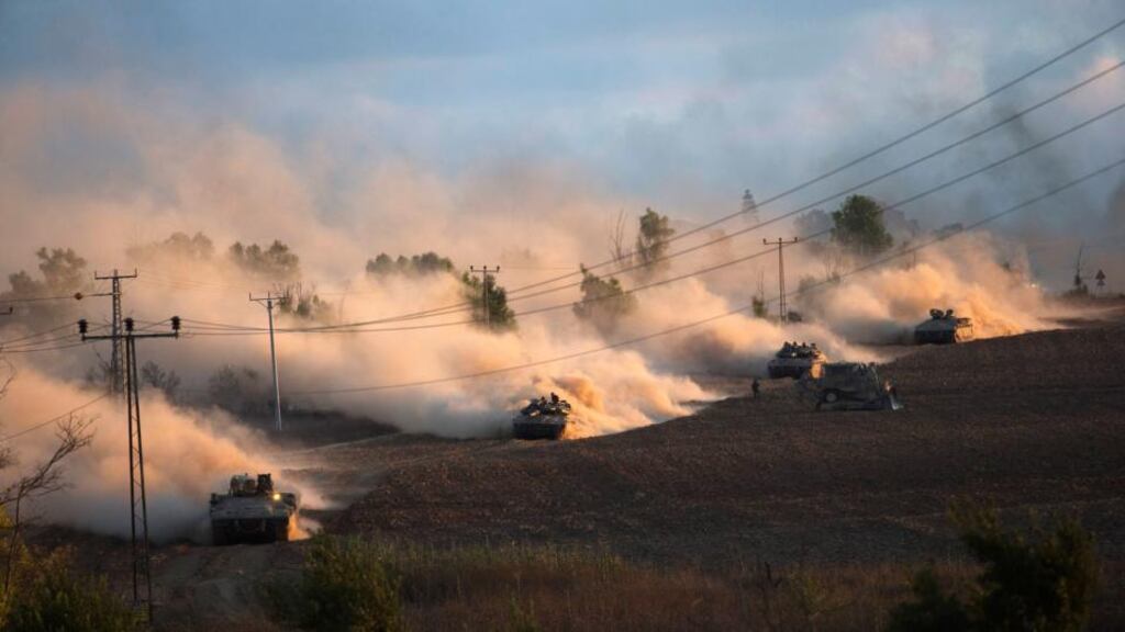 Israeli tanks manoeuvre outside the northern Gaza Strip. The UN secretary general Ban Ki-moon is on his way to the Middle East today to help end the conflict in Gaza between Israel and Hamas. Photograph: Ronen Zvulun/Reuters
