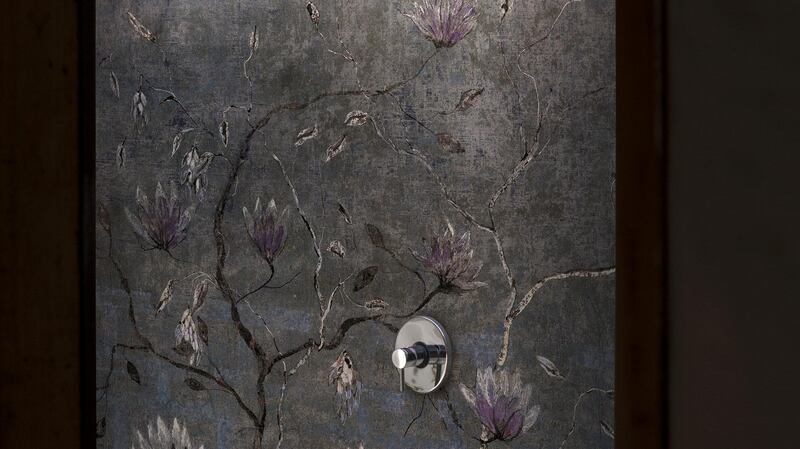 Add a little wallpaper  to bring floral pattern into a shower stall setting.