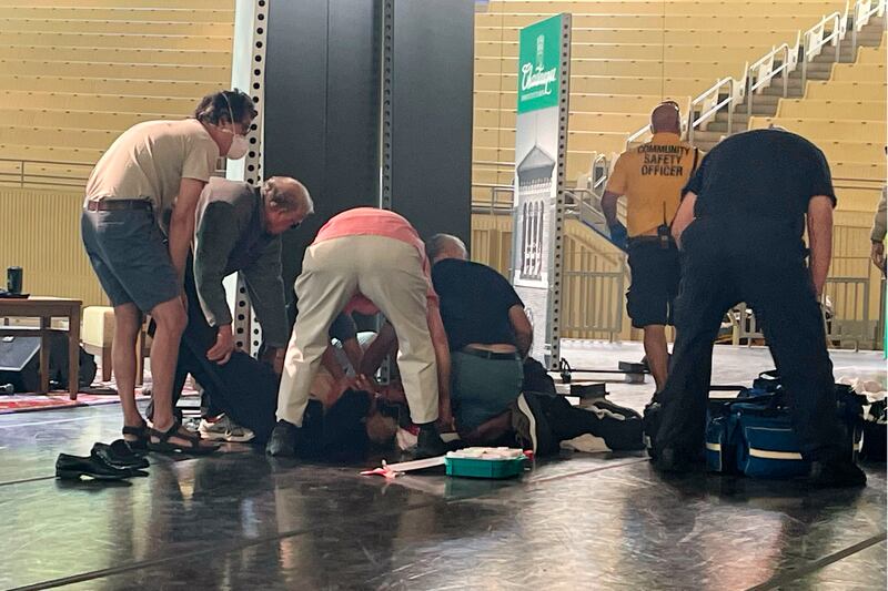 Author Salman Rushdie is tended to after he was attacked during a lecture at the Chautauqua Institution. Photograph: Joshua Goodman/AP