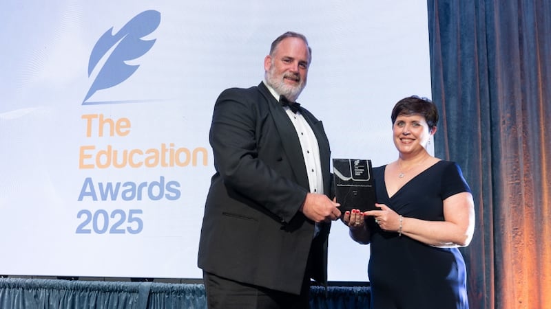 Graham Heaslip, awards judge, presents the excellence in education by a professional body to Joanne Keane, LIA