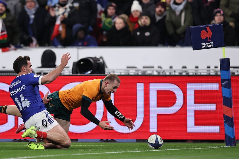Australia's Max Jorgensen scores a try during his team's defeat to France at Stade de France last Saturday. Photograph: Anne-Christine Poujoulat/AFP via Getty Images