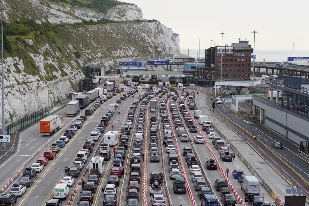 Cars queue at the check-in at the Port of Dover in Kent as many families embark on getaways following the start of summer holidays for many schools in England and Wales. Photographer: Gareth Fuller/PA