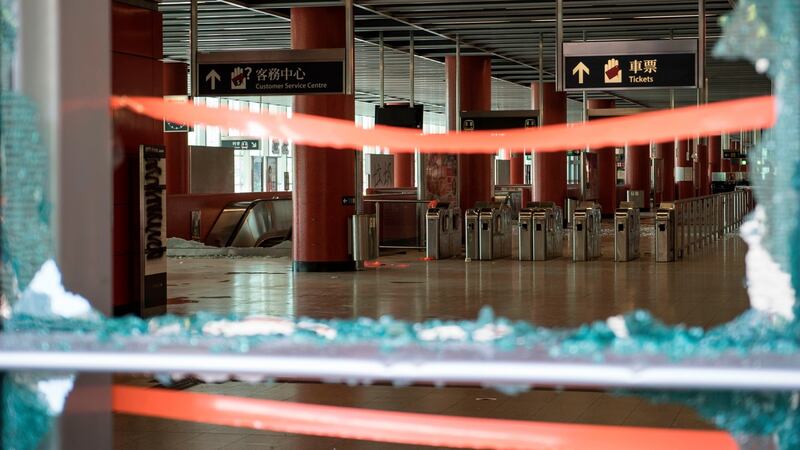 Shattered glass and damaged turnstiles at a metro  station in Tseung Kwan O, a residential area in Hong Kong on Saturday morning.  Photograph: Getty