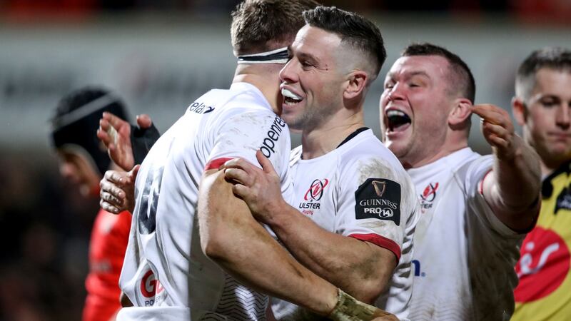 Ulster’s Matthew Rea celebrates scoring a try against Munster with scrumhalf John Cooney. Photograph:  Dan Sheridan/Inpho