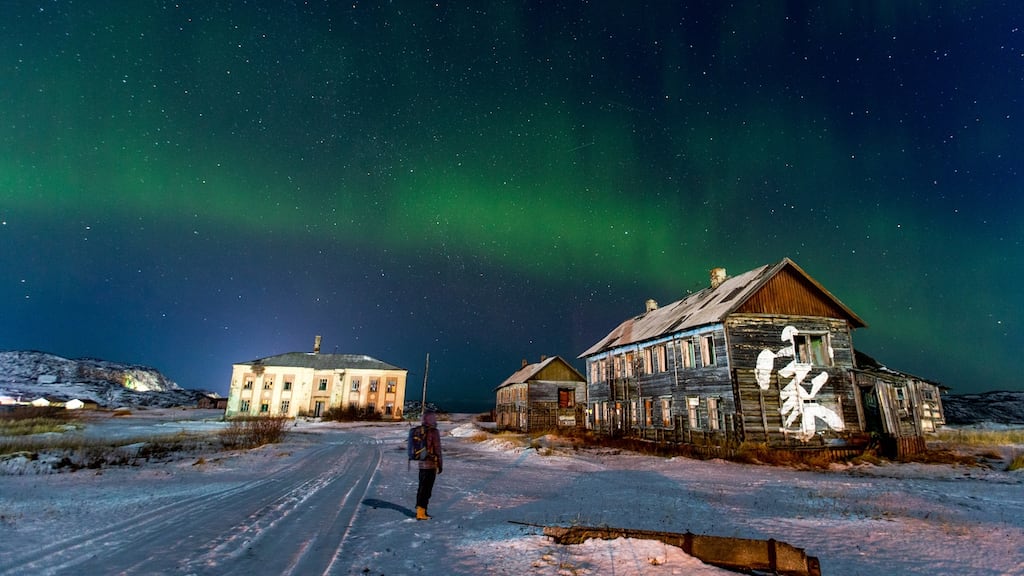 The Northern Lights over Teriberka, a village with a population of about 1,000, located some 120km from Murmansk on the Russian Arctic coast. Photograph: Yelena Vereshchaka/Tass