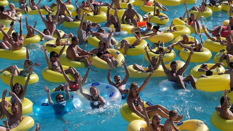 Visitors at the open-air aquapark Dreamland in Minsk, Belarus. Photograph: Tatyana Zenkovich/EPA