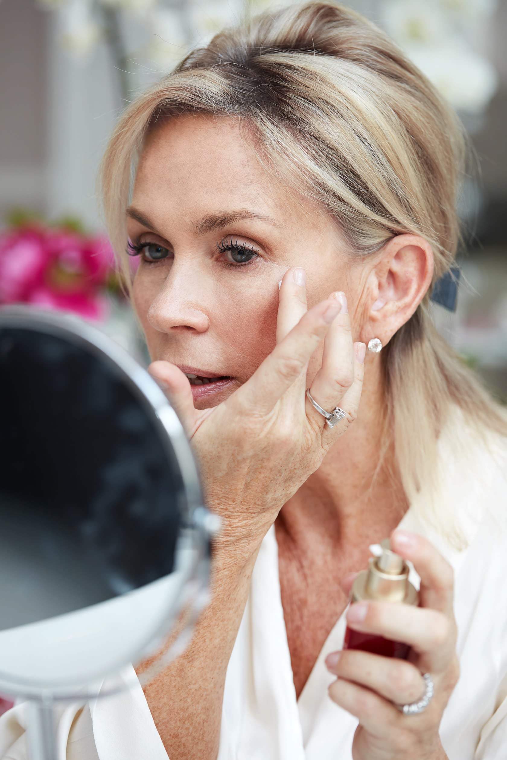 <strong>50s: what’s happening?</strong><br />
If you take a look at skin cells at this age under a microscope, you’ll see that their shape has changed from a youthful, star-shape to a spindly floppy one, causing slacking and deeper lines. So the key to boosting skin density is to help inject structure back into the cells with ingredients like peptides. Skin needs lots more TLC now, a good dose of lipids to support the skin barrier and light layers of targeted products to keep it springy.<br />
<strong>Step 1: sparing layering</strong><br />
While it may seem logical to use a thicker cream to help skin density, rich, heavy creams can often weigh skin down and aggravate sensitivities. Light layers of nourishment are needed first, via a good all-round serum, sealed in with a plant based, hydrating moisturiser or lotion, and possibly a morning and evening beauty oil is a better combination than one heavy product. In addition, the thinner skin gets, the more ultra violet light is able to penetrate and damage DNA, so vigilant SPF application on face, neck, hands and bust becomes even more crucial now.
