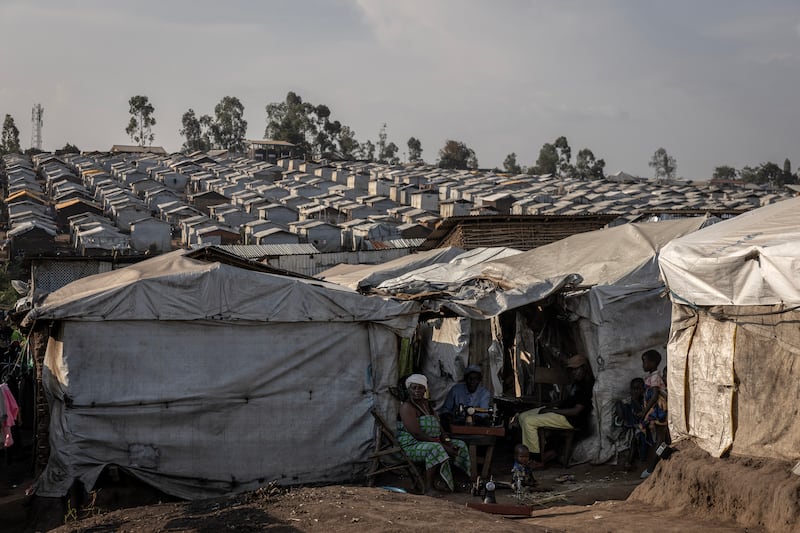 A camp in Bunia in the DRC's Ituri province, where people displaced by violence are living in dangerous conditions and fighting the virus with very little clean water. Photograph: Finbarr O'Reilly/The New York Times
                      