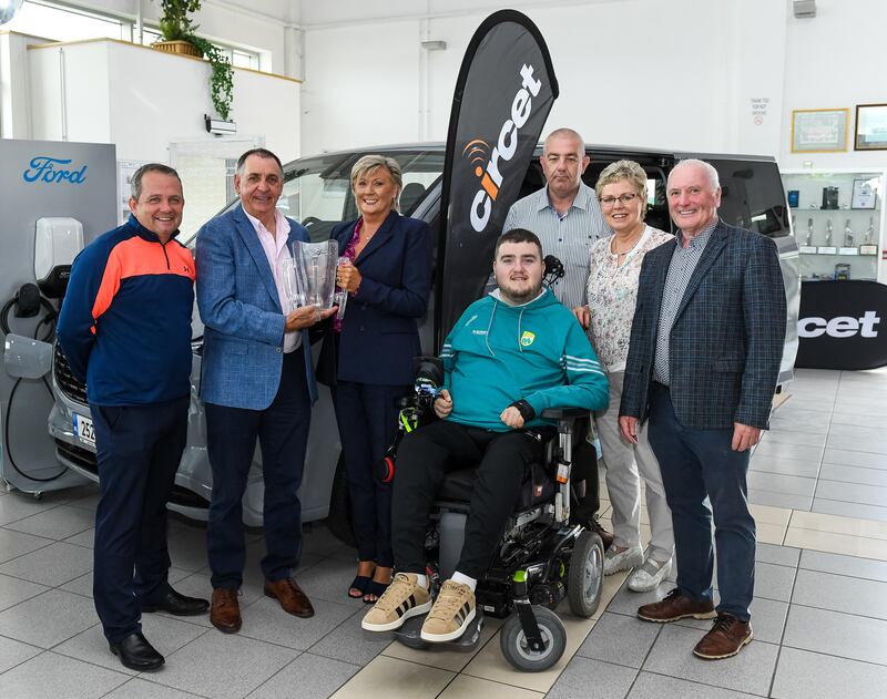 Ian O'Connell received a modified Ford at the launch of the annual Circet All-Ireland GAA Golf Challenge in Michael Lyng Motors, Kilkenny. Also pictured are Antrim hurling manager Davy Fitzgerald, Liam Daniels, Vanessa Cunningham of Circet, Michael O'Connell, Rose Murphy and Michael Lyng. Photograph: Matt Browne/Sportsfile