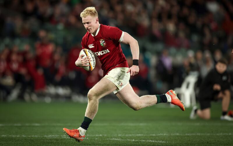 Lions Jamie Osborne runs in to score a try. Photograph: Tom Maher/Inpho