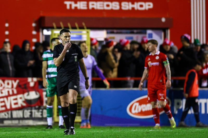 Referee Rob Hennessy blows the final whistle at the end of an absorbing Premier Division match between Shelbourne and Shamrock Rovers at Tolka Park on March 9th. Photograph: Ben Brady/Inpho