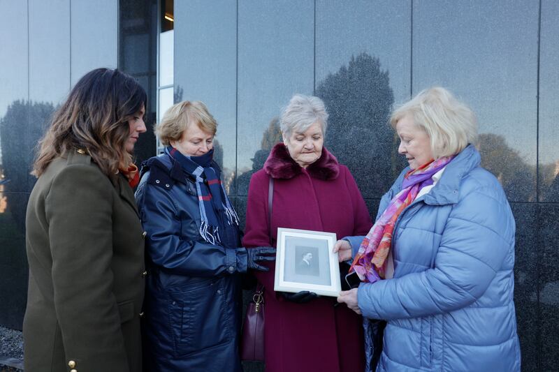 Bairbre Kelly, far left, with relatives at a commemoration ceremony. Her great-grandfather Gerald O’Connor, a private in the National Army, was killed in the Civil War