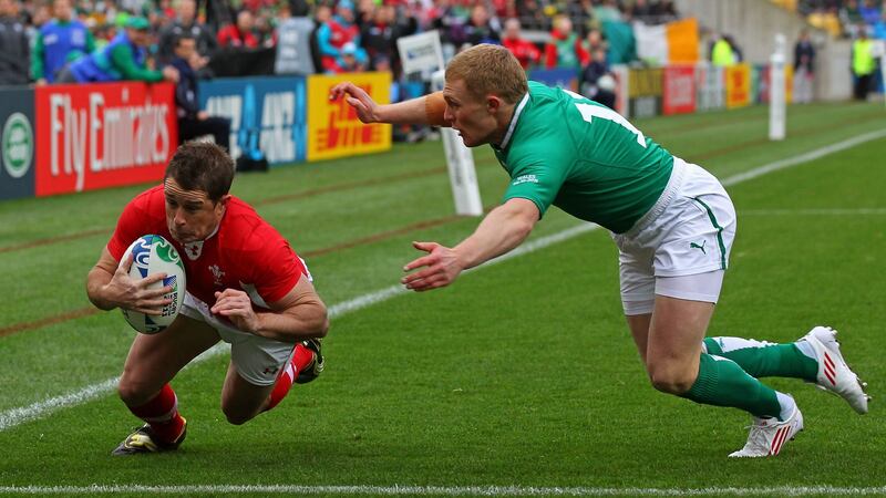 Former Wales winger  Shane Williams, seen here scoring during the World Cup quarter-final against Ireland in Wellington in 2011, will join Donegal club champions Glenswilly as part of ’The Toughest Trade’. Photograph:  Alex Livesey/Getty Images