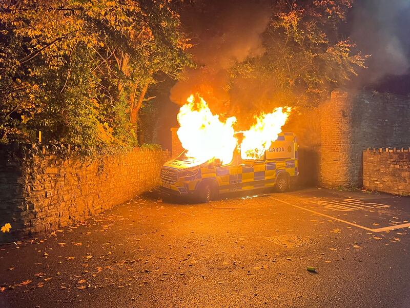 A Garda van was set alight during the unrest. Photograph: Ronan McGreevy