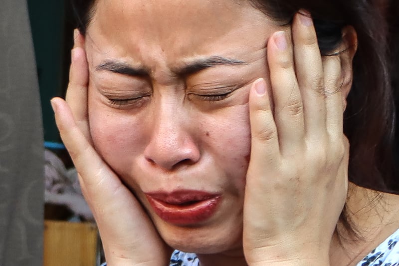 A family member of one of the crew members of Air India flight 171 mourns at her residence in Thoubal Mayai Leikai near Imphal in the Indian state of Manipur on June 12th, 2025. Photo by AFP via Getty Images    