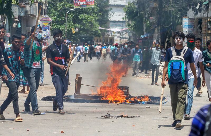 Demonstrators clash with police during ongoing student protests at Mirpur in Dhaka, Bangladesh. Photograph: Monirul Alam/EPA-EFE