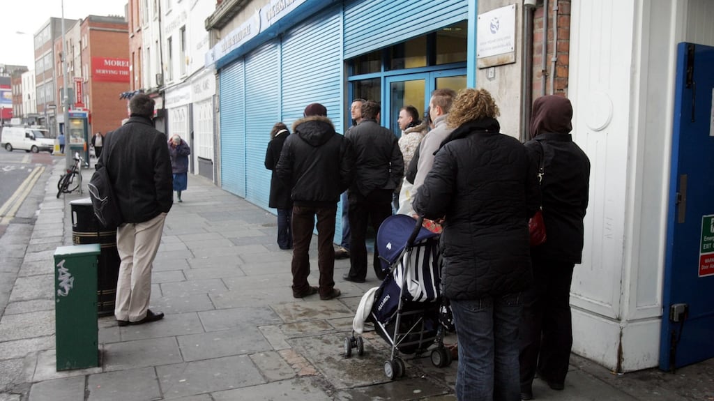 People outside the social welfare office on Thomas Street in Dublin. Photograph: Cyril Byrne/The Irish Times