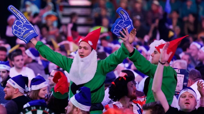 Darts fans cheer on the players during day eight of the  World Darts Championships at Alexandra Palace, London. Photograph: John Walton/PA Wire