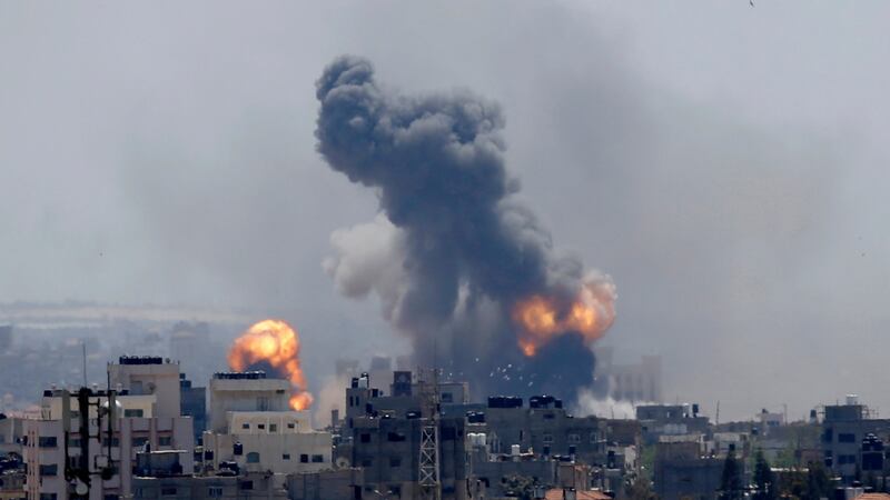 Smoke rises from an explosion caused by an Israeli air strike in Gaza City on May 4th: Israel defies international law and human rights standards with impunity.  Photograph: Hatem Moussa