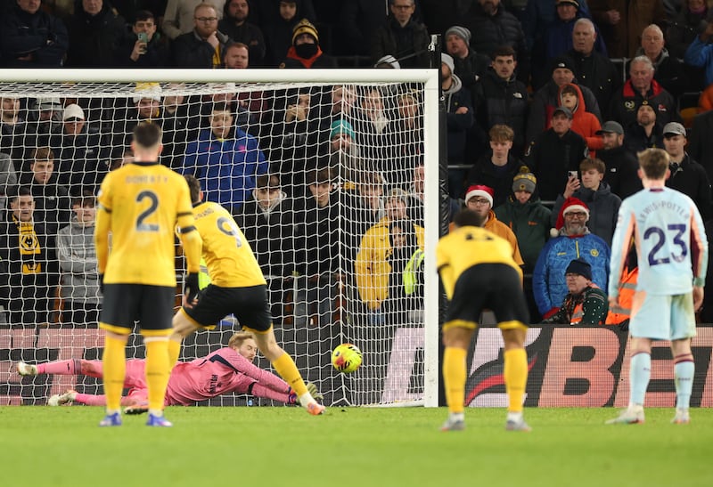 Caoimhín Kelleher of Brentford saves a penalty shot from Jorgen Strand Larsen of Wolves. Photograph: Dan Mullan/Getty