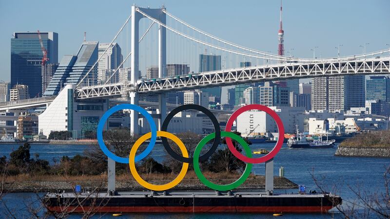 An Olympic rings monument beside the Rainbow bridge at Odaiba Marine Park in Tokyo. Photograph:  Franck Robichon/EPA