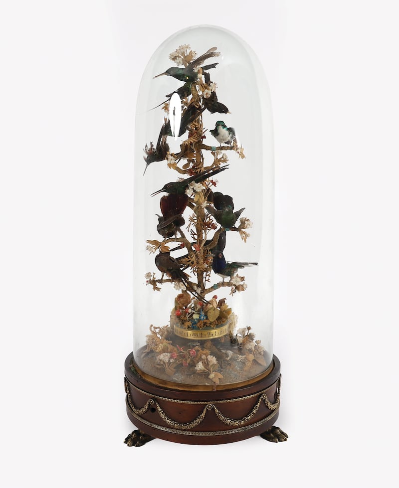 A rare 19th-century French automaton bird clock under a glass dome (€5,000-€8,000)