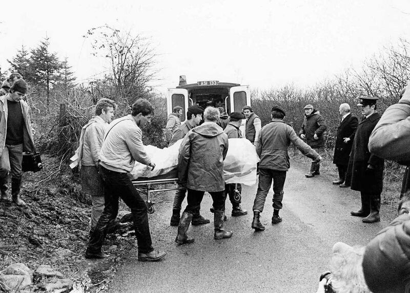 The bodies of Private Patrick Kelly and Garda Gary Sheehan being removed from Derrada Wood after they were killed, December 1983. Photograph: Pat Langan/The Irish Times