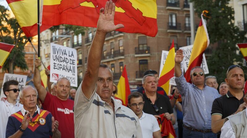 Demonstrators do the fascist salute during a protest against the independence of Catalonia under the slogan ‘For the unity of Spain’ called by far right wing party Falange Espaola de las Jons at Salvador Dali Square on October 7, 2017 in Madrid, Spain. Photograph: Pablo Blazquez Dominguez/Getty Images
