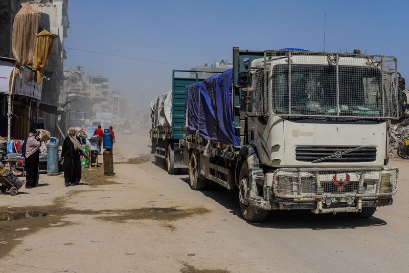 Humanitarian aid trucks drive across northern Gaza after entering through Zikim, on Sunday. Photograph: Ramez Habboub/Middle East Images/AFP via Getty