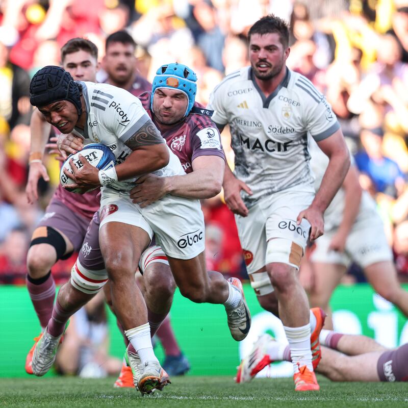 Ulupano Seuteni is tackled by Munster's Tadhg Beirne. Photograph: Ben Brady/Inpho