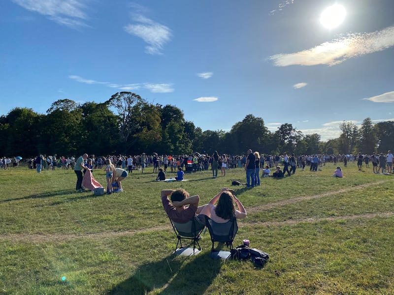 People gather in the Phoenix Park in Dublin to watch the solar eclipse on Wednesday. PA Photo. Photo by Jonathan McCambridge/PA Wire