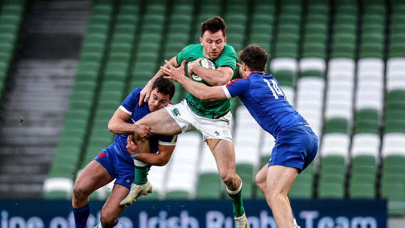 Ireland’s Hugo Keenan is tackled by Arthur Vincent and Damian Penaud of France during their Six Nations match at the Aviva Stadium on Sunday.  Photograph: Dan Sheridan/Inpho
