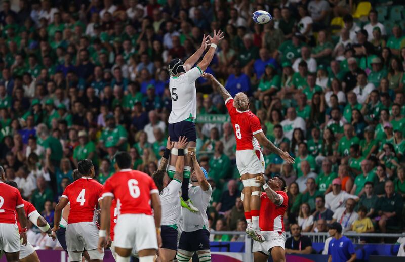 Ireland’s James Ryan competing in the lineout with Tonga’s Vaea Fifita. Photograph: Laszlo Geczo/Inpho