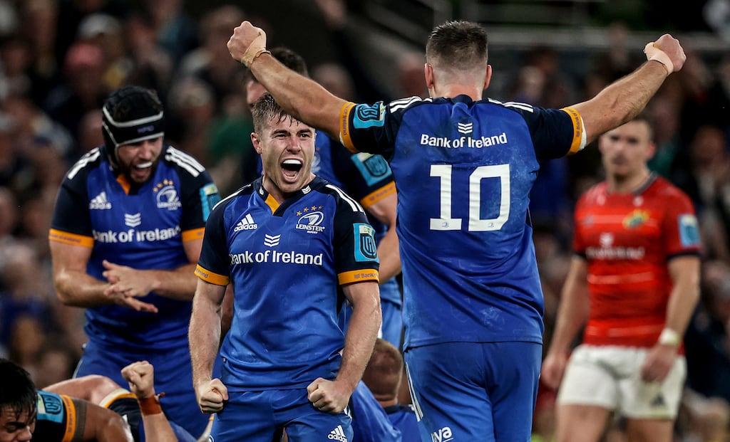 Luke McGrath celebrates a penalty with Johnny Sexton during the victory over Munster at the Aviva Stadium. Photograph: Photograph: Ben Brady/Inpho