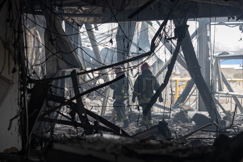 Ukrainian rescuers walk through the rubble of a building heavily damaged in a Russian attack in Odesa last week. Photograph: Oleksandr Gimanov/AFP/Getty