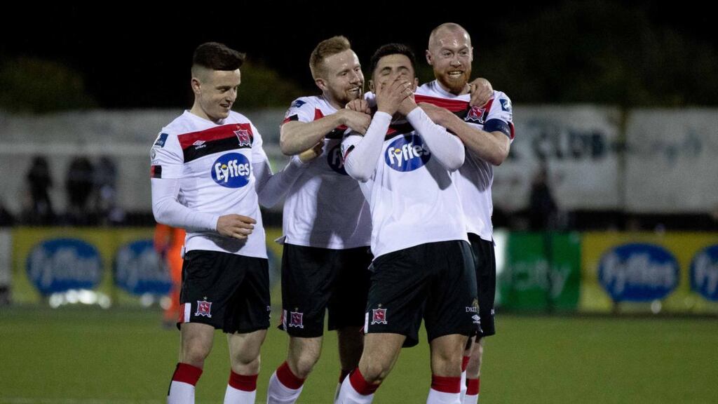 Dundalk celebrate with Jordan Flores after he put Dundalk 3-0 up against Cork City. Photograph: Morgan Treacy/Inpho