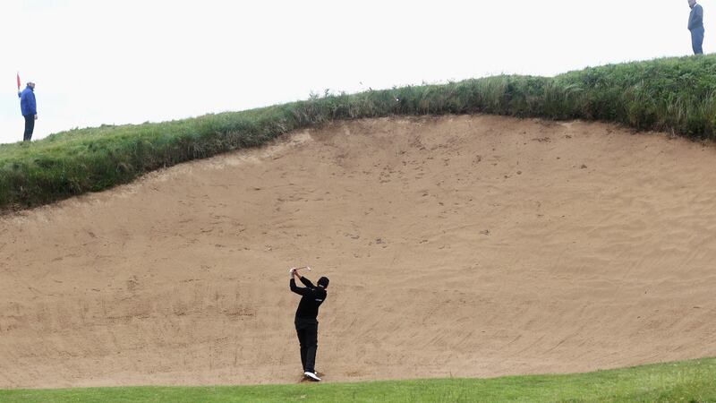 Jamie Donaldson plays from a bunker on the 17th during the 2012 Irish Open. Photo: Dean Mouhtaropoulos/Getty Images