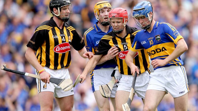 Jackie Tyrrell with Lar Corbett, Tommy Walsh and Pa Bourke during the 2012 All-Ireland hurling final.   Photograph: James Crombie/Inpho