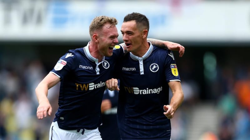Milwall’s Shaun Williams  celebrates scoring his side’s second goal with Aiden O’Brien  during the Sky Bet Championship match against  Derby County at The Den. Photograph: Jordan Mansfield/Getty Images