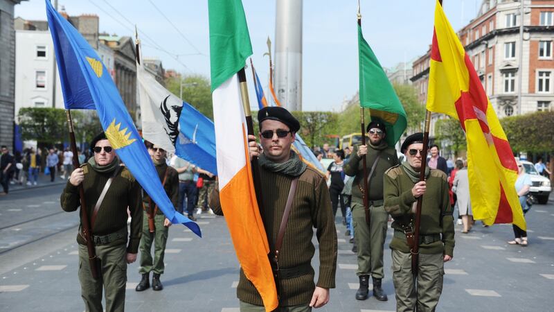 Members of Republican Sinn Féin stand on Dublin’s O’Connell Street  during their Easter Rising commemoration on Monday. Photograph: Aidan Crawley/The Irish Times