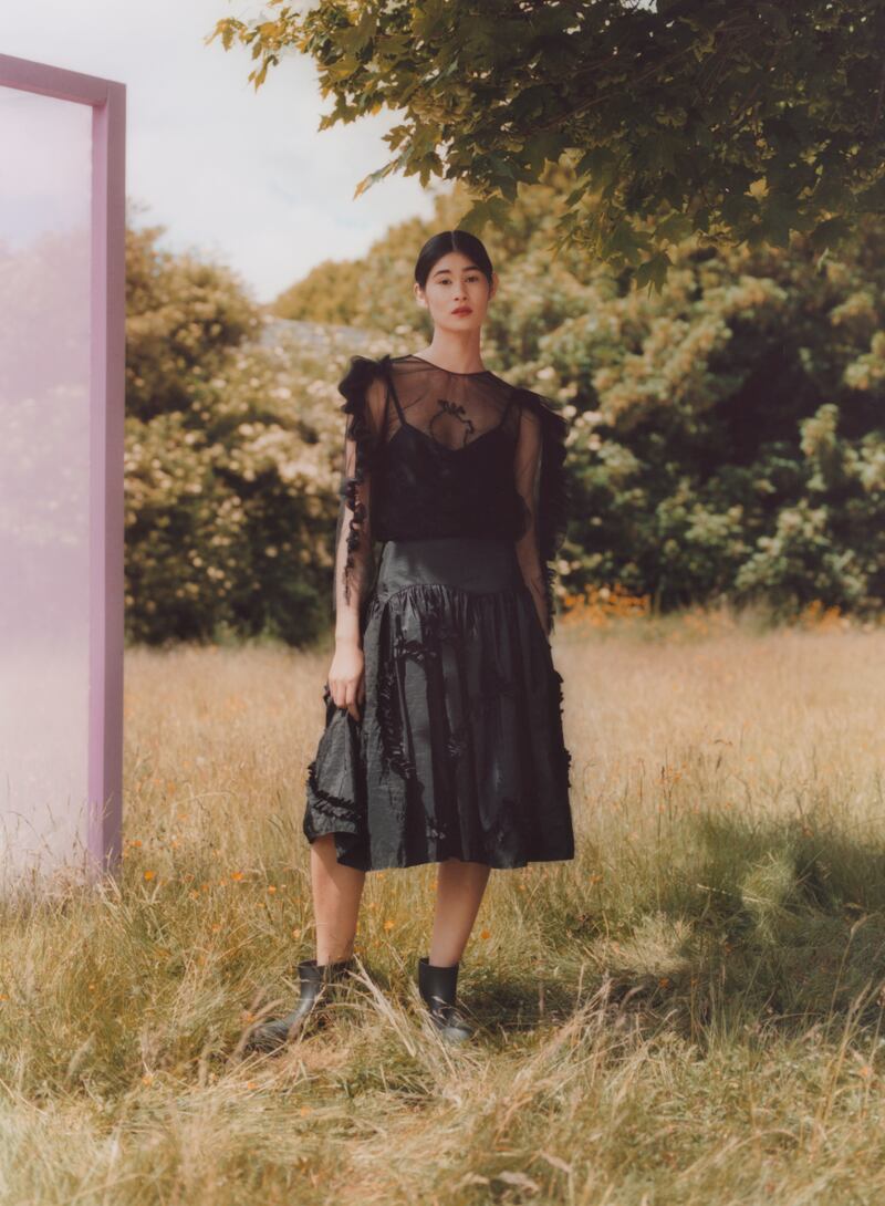 Black taffeta skirt (€350), black tulle blouse (€295), modelled by Amy Jackson. Photograph: Philip White; art director: Darren Feeney; stylist: Yana McKillop assisted by Marlon Hiraldo; make-up artist: Amber Smith; hair stylist: David Cashman