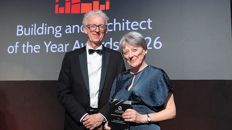 Patrick Flynn, awards judge, presents the building of the year - educational (over 10m) to Louise Cotter, Cotter & Naessens Architects